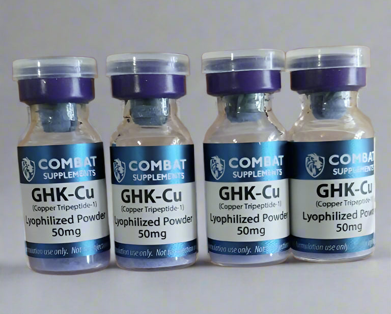 Five vials labeled 'GHK-Cu' in a clear plastic container on a wooden surface.